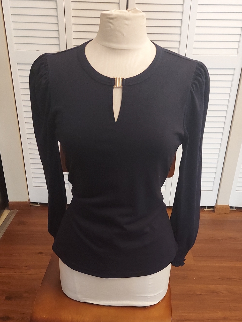 Navy Long-Sleeve Keyhole Top with Gold Accent